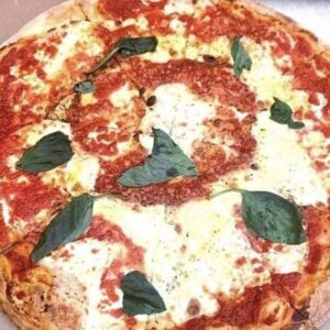 Topped with ham, pineapple, and cheese.