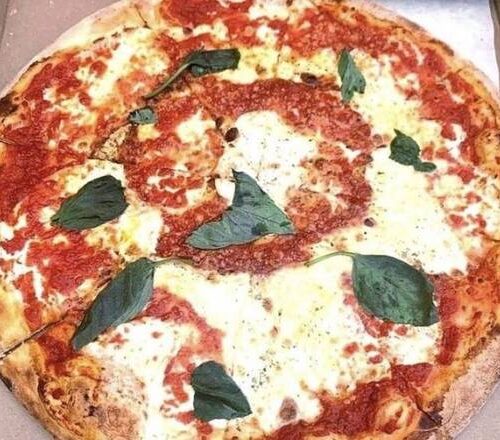 Topped with ham, pineapple, and cheese.